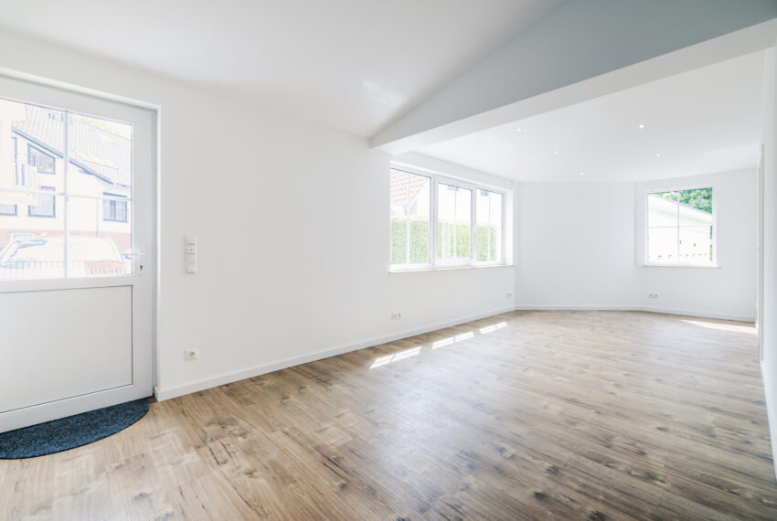 Wohnzimmer mit Zugang zur Terrasse